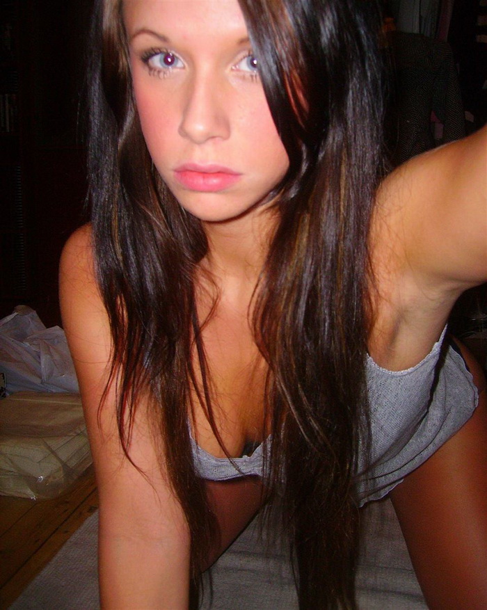 Chick showing off her huge breasts