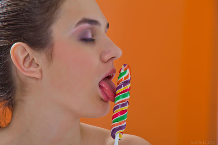 Naked Hottie Playing With Candy